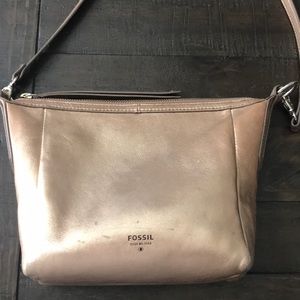 Used Fossil rose gold cross body purse